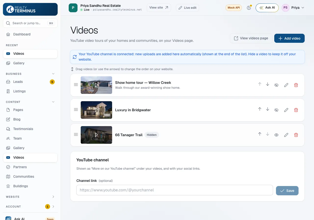 The Videos page in the RealtyTerminus admin with a list of YouTube videos (thumbnail, title and description) and move, hide, edit and delete buttons.